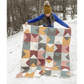 Love Notes Quilt held by Tamara Darragh in the snow