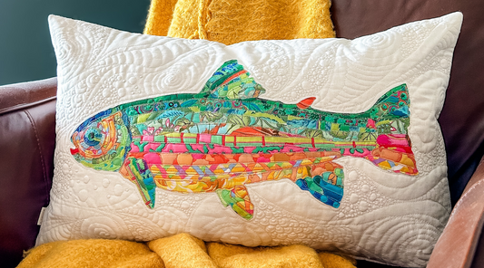 Rainbow Trout made with fabric scraps from Free Spirit Fabrics and quilted with Aurifil 50wt thread. The quilted fish is made into a zipper pillow. Made by Tamara Darragh for Remi Vail Studio.