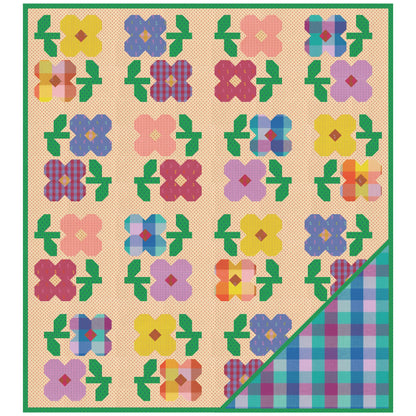 A quilted blanket or quilt pattern featuring a grid of colorful floral motifs on a beige background with a green border. The bottom-right corner is folded over to reveal a plaid pattern in shades of blue, green, purple, and pink.