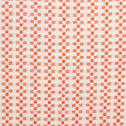 A close-up of a woven fabric pattern featuring orange and white checkered squares.