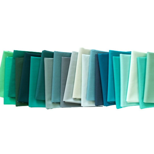 Row of fabric swatches in various shades of green and blue on a white background